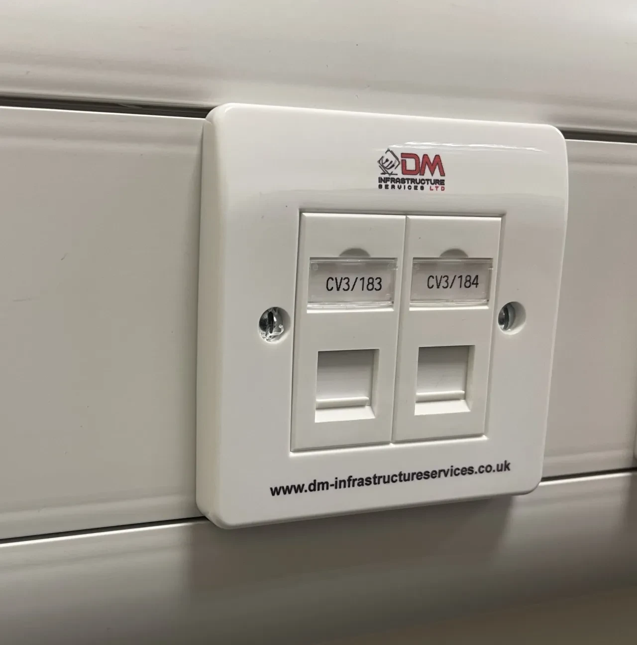 DM Infrastructure Services branded dual network outlet