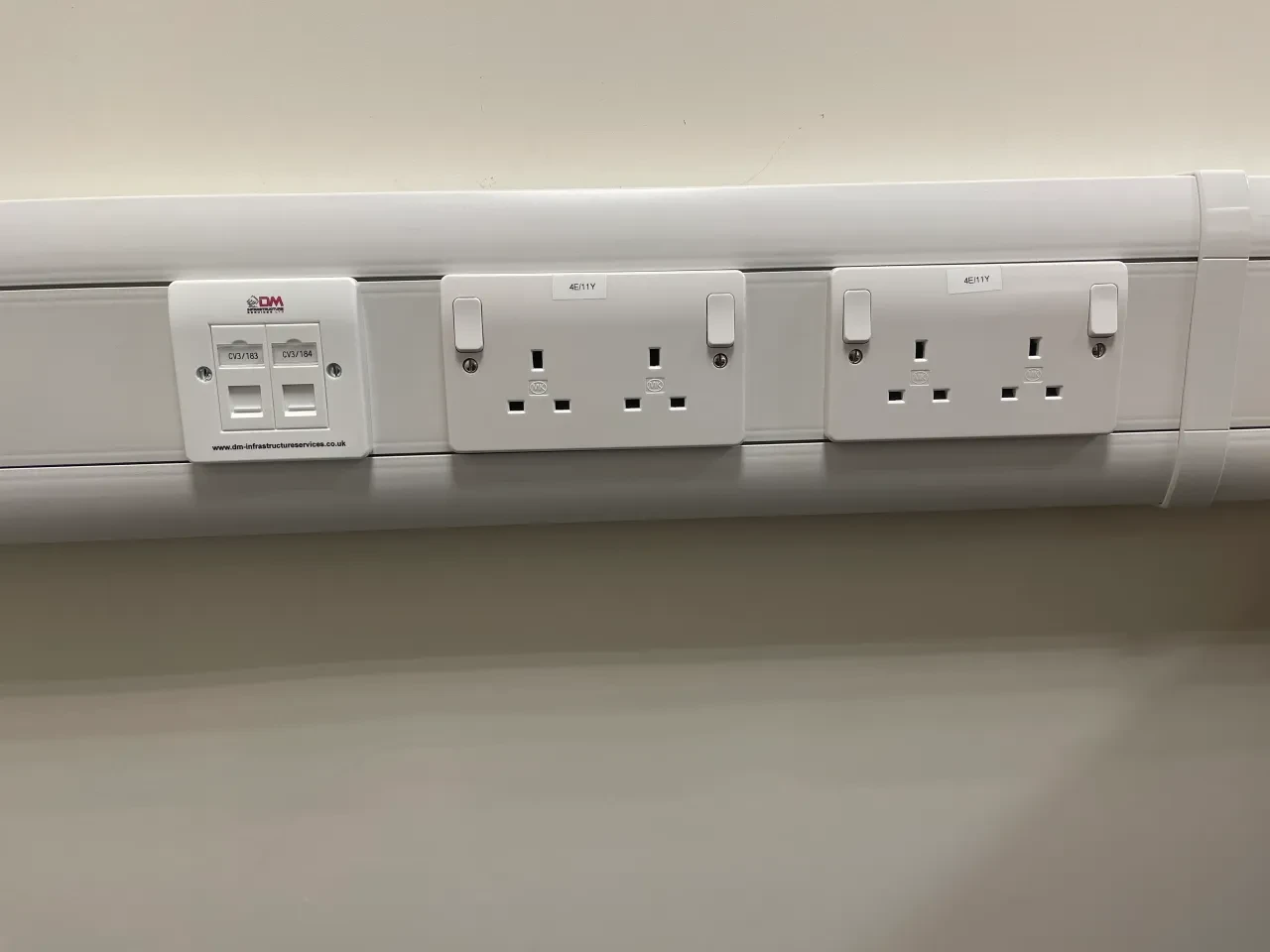Wall trunking with power and data outlets